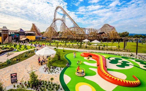 Roller coaster and play area at Energylandia Amusement Park, Poland.