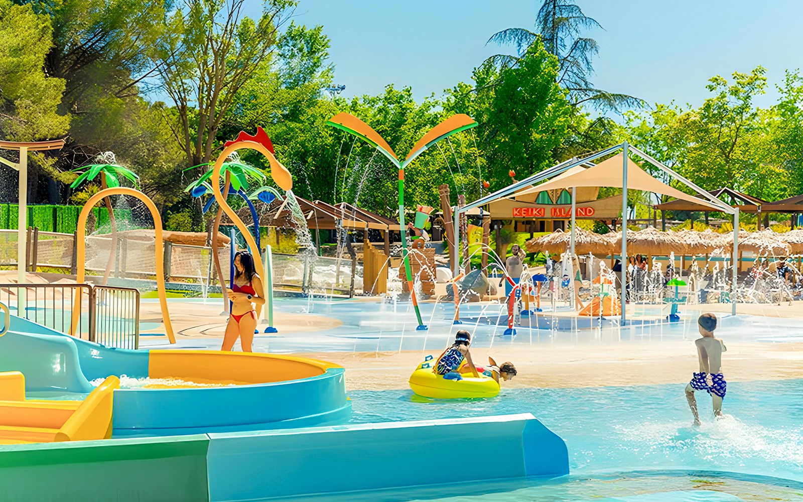 Aquopolis Villanueva de la Canada Mini Turbolance water slide with riders descending.