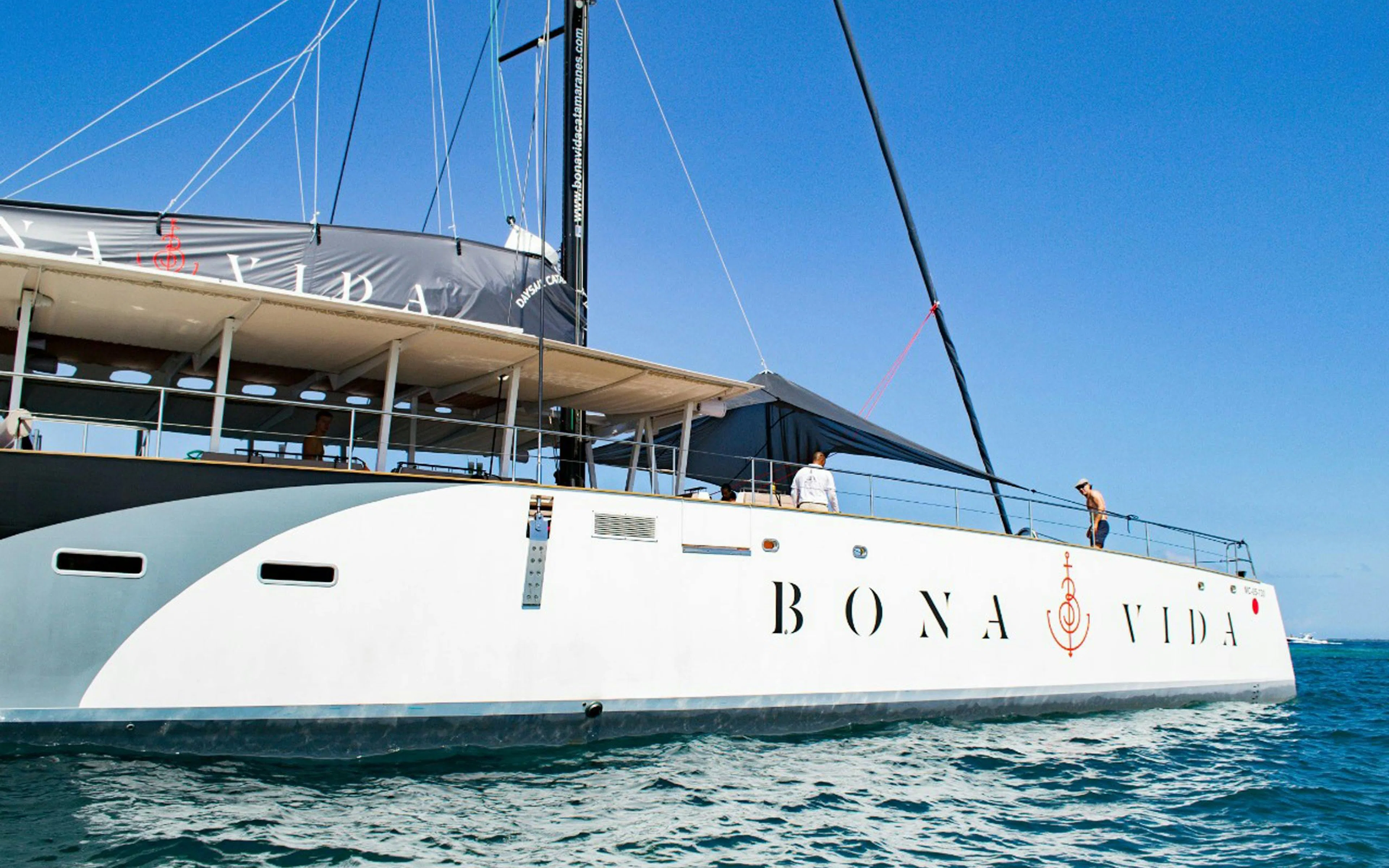 Catamaran on Cartagena waters during sunset cruise with open bar.
