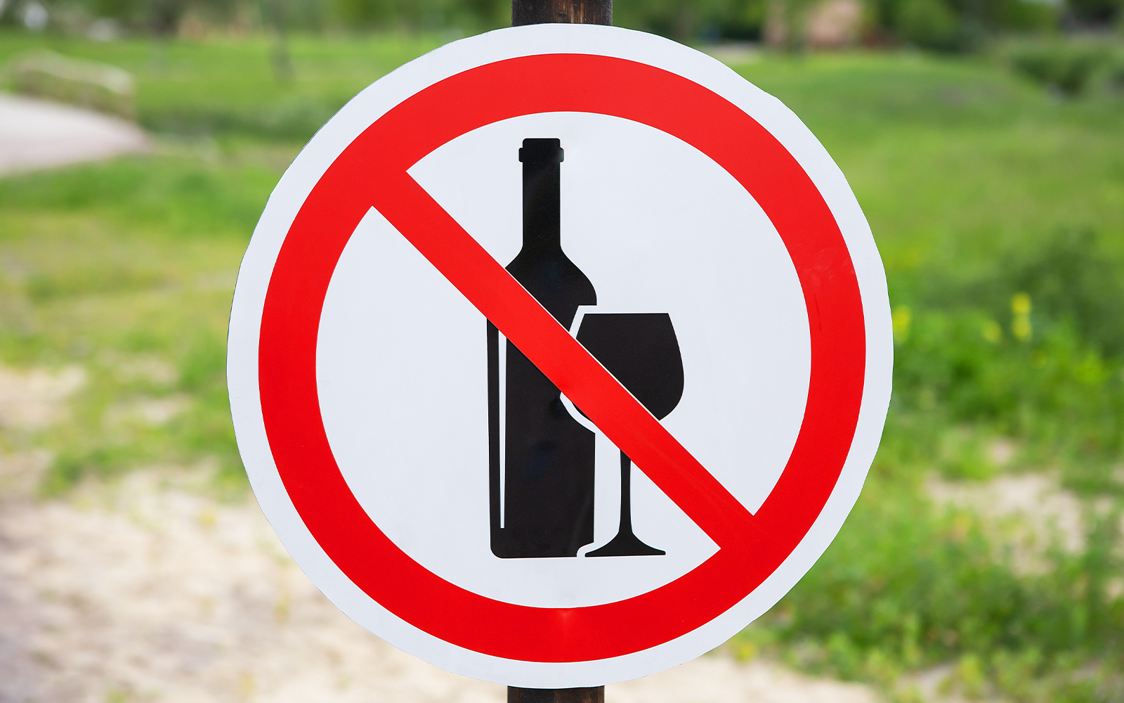 No alcohol sign with bottle and glass crossed out.