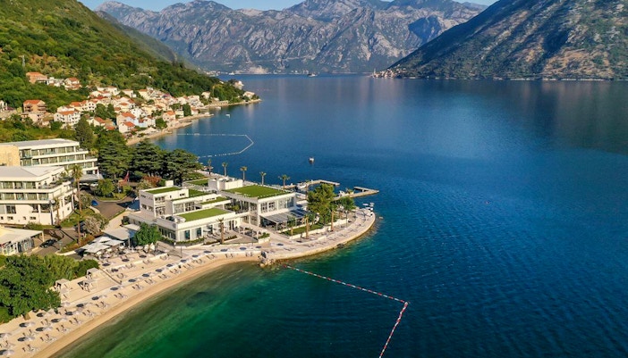 Aerial view of Kotor Bay with mountains and coastline in Montenegro.