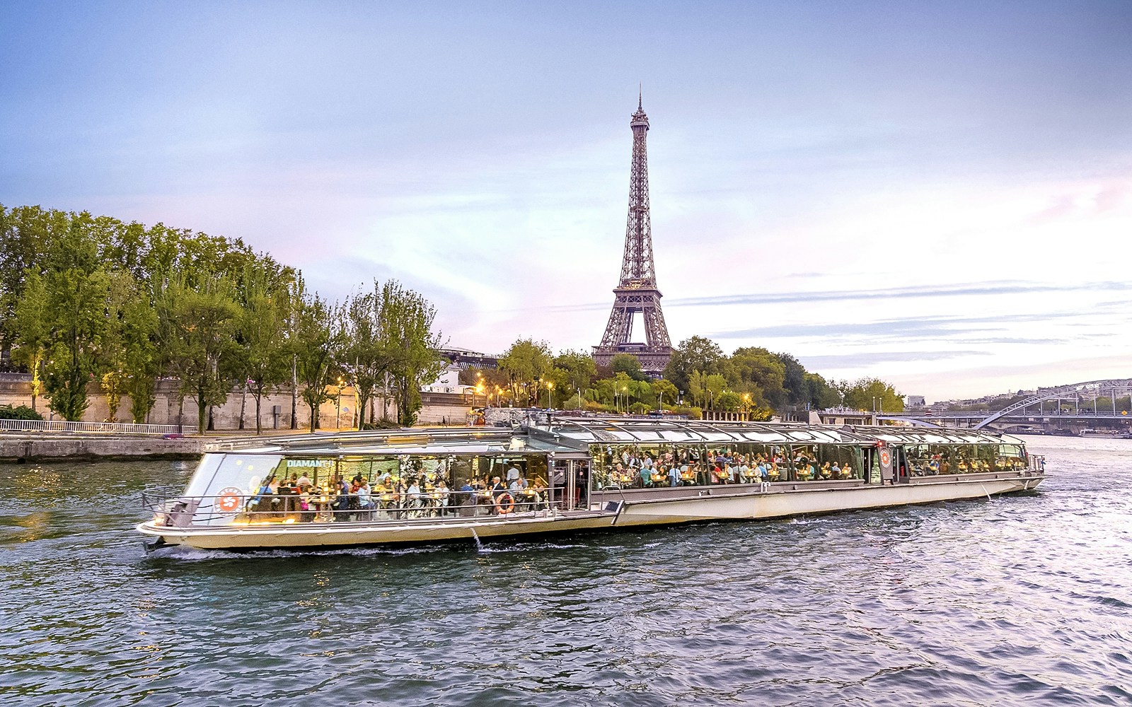 Panoramic cruise on Seine River with Eiffel Tower view, Paris New Year’s Eve 2025.
