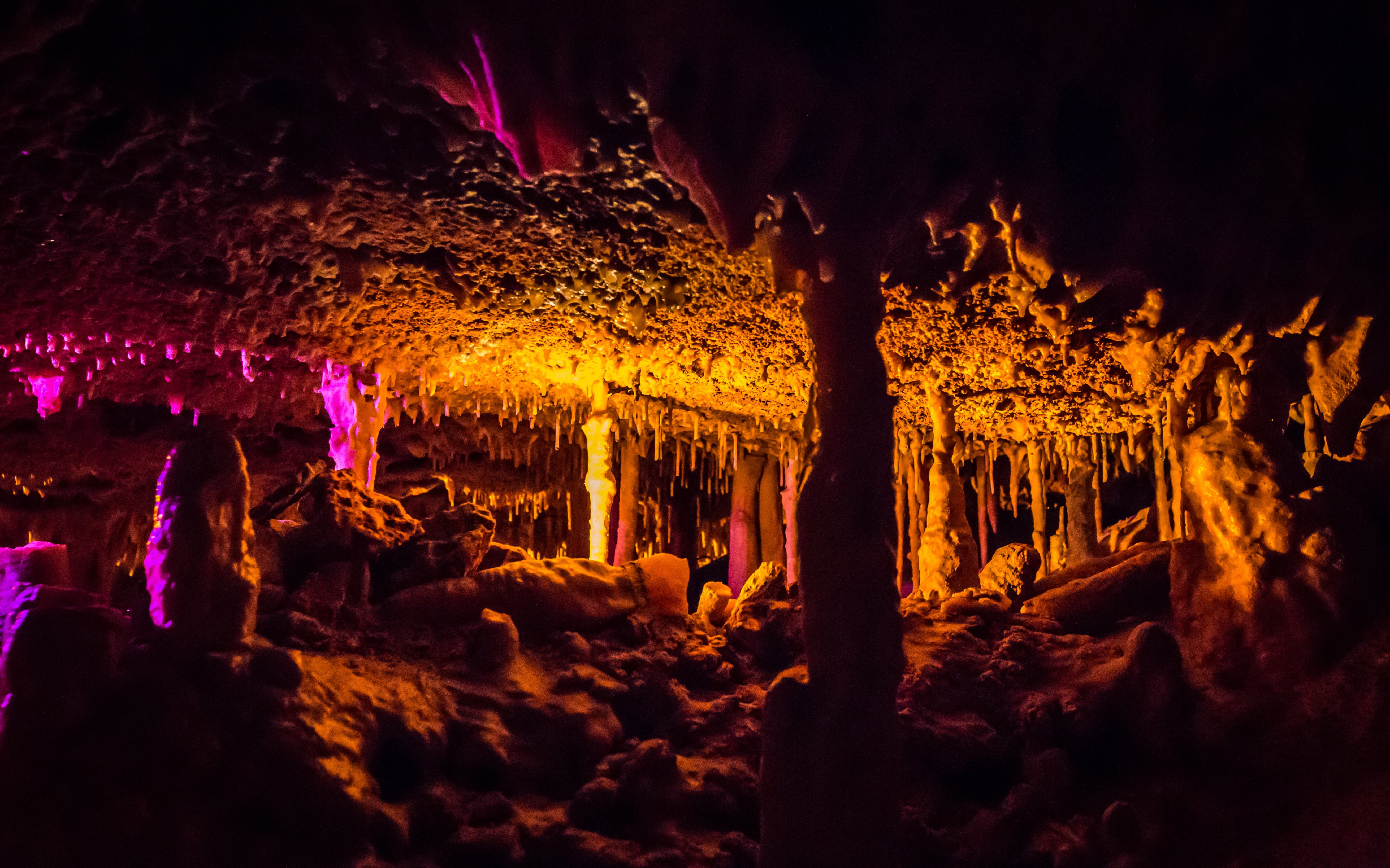 Stalactites and stalagmites in illuminated Hams Caves interior, Mallorca.