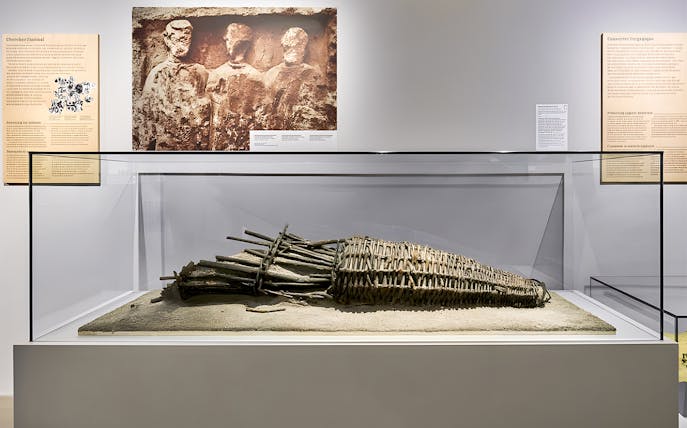 Medieval artifact displayed in Notre Dame Crypt, Paris exhibit.