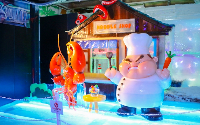Chef and lobsters ice sculptures at Rainbow Frosty Playground Noodle Shop, Singapore Snow City.