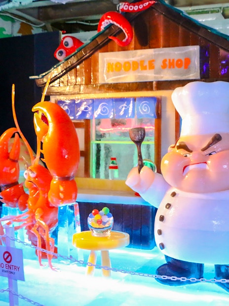 Chef and lobsters ice sculptures at Rainbow Frosty Playground Noodle Shop, Singapore Snow City.
