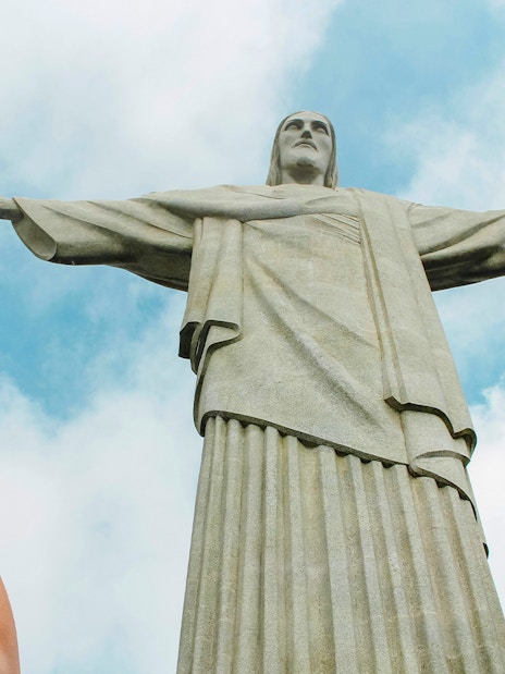 Person photographing Christ the Redeemer statue in Rio de Janeiro.