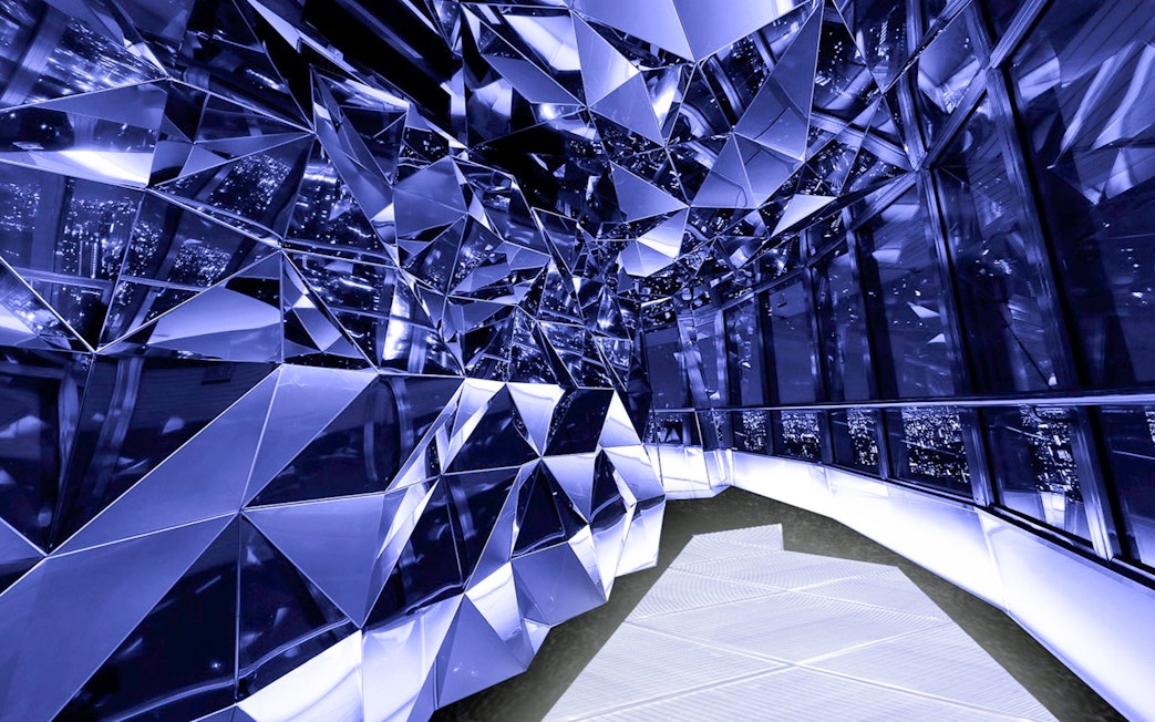 Reflective mirrored interior of Tokyo Tower Diamond Tour.