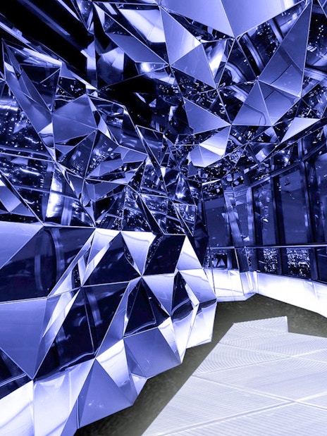 Reflective mirrored interior of Tokyo Tower Diamond Tour.