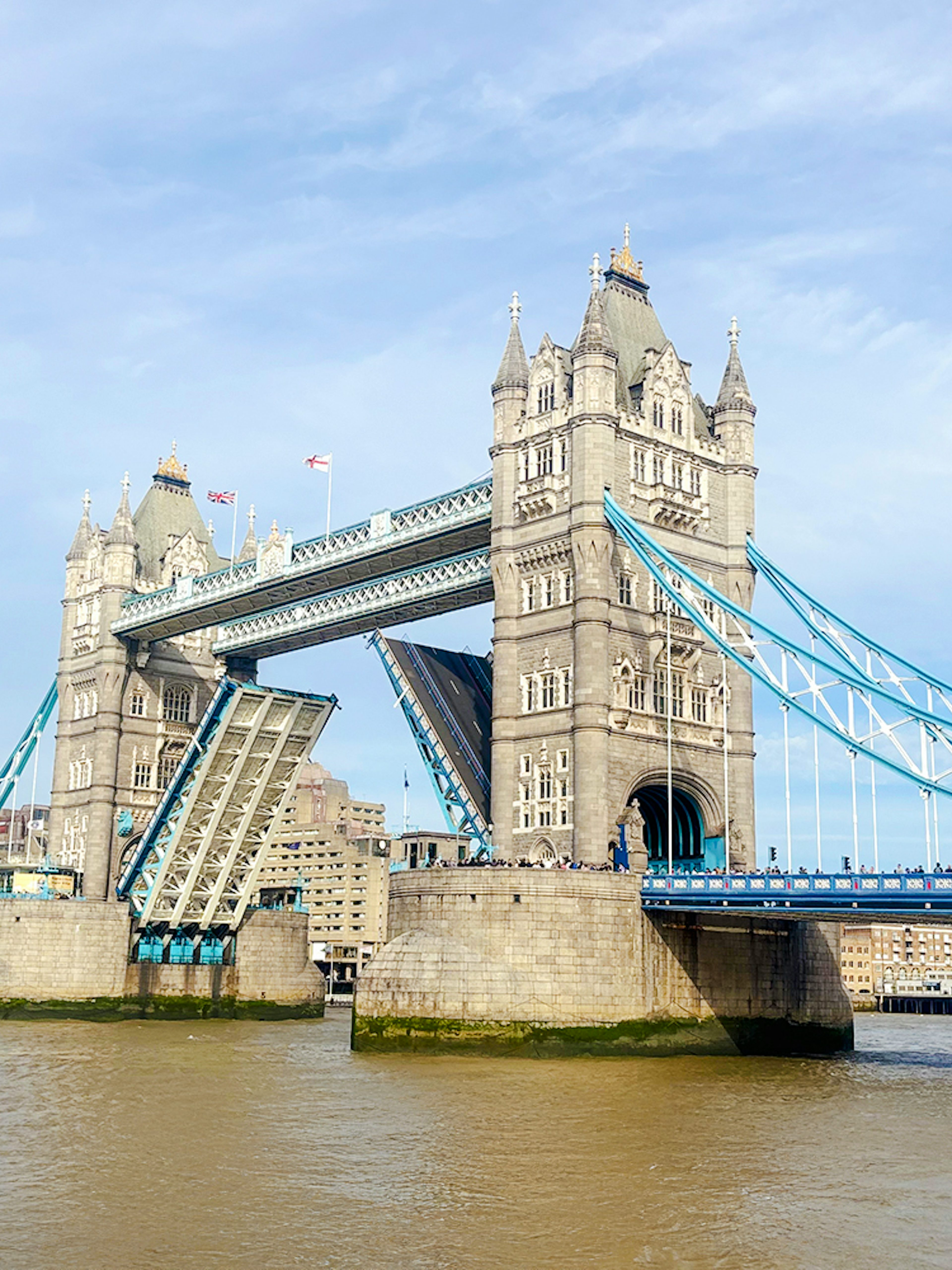 Tower Bridge in London with its bascules raised for a bridge lift.