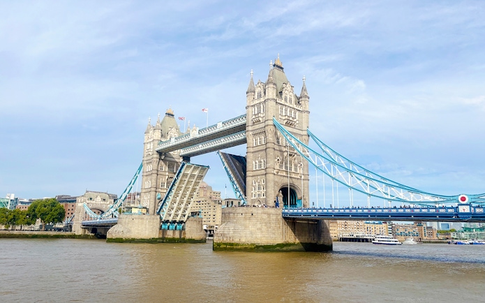 Tower Bridge in London with its bascules raised for a bridge lift.