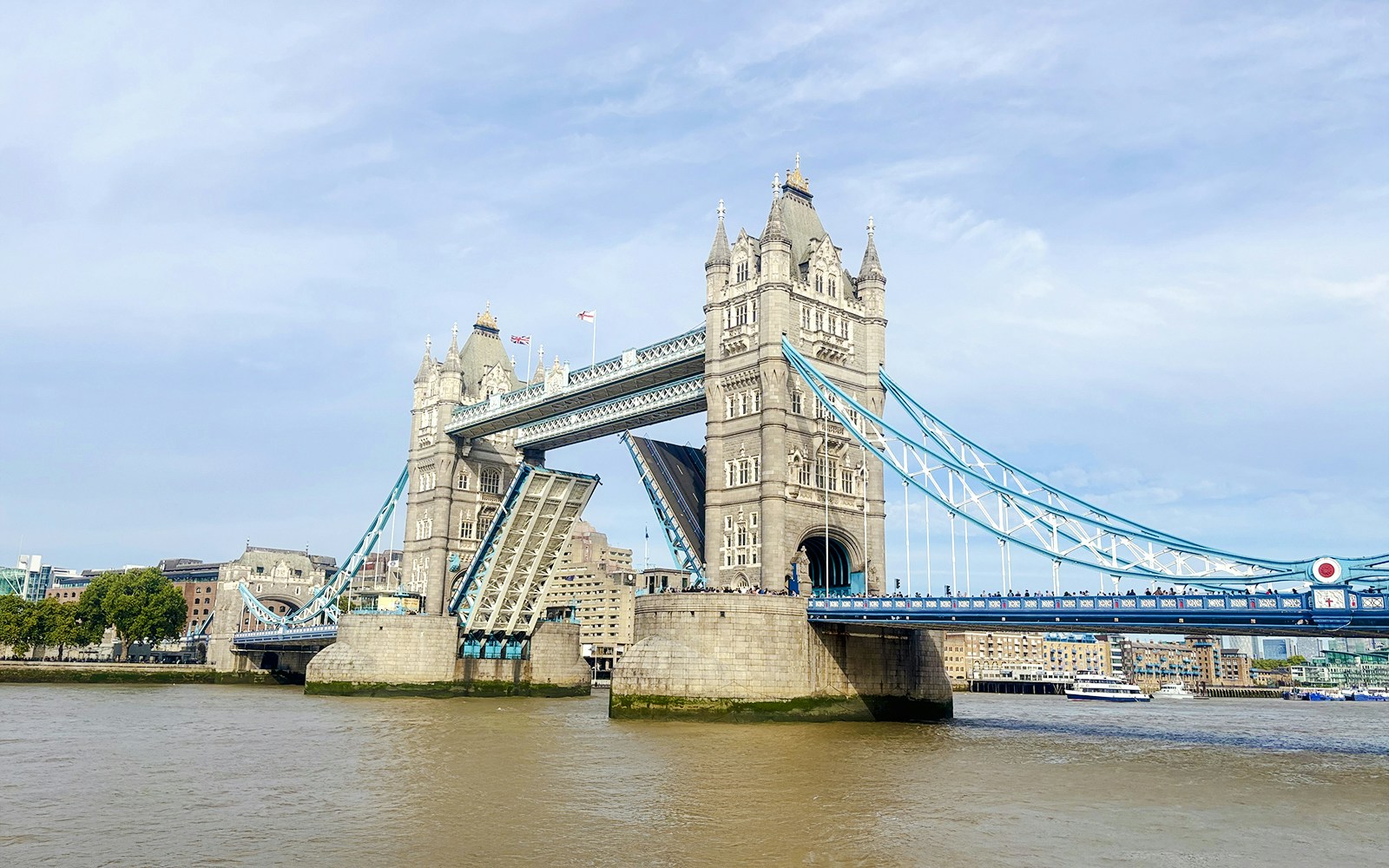 Tower Bridge in London with its bascules raised for a bridge lift.