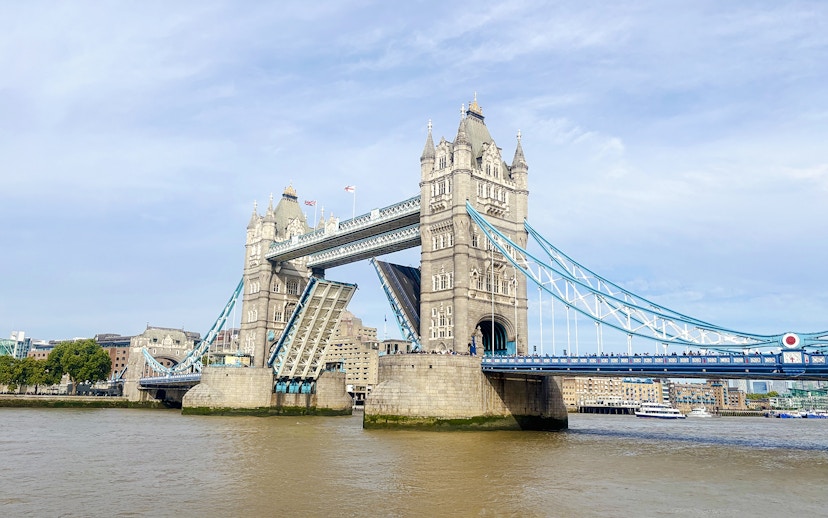 Tower Bridge in London with its bascules raised for a bridge lift.