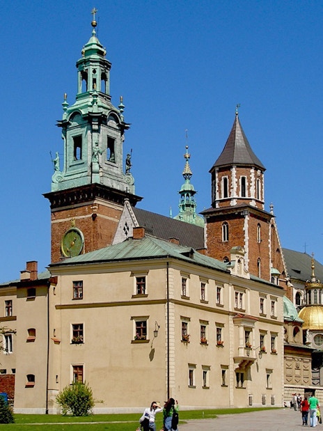 Wawel Cathedral exterior with tourists in Krakow, Poland.