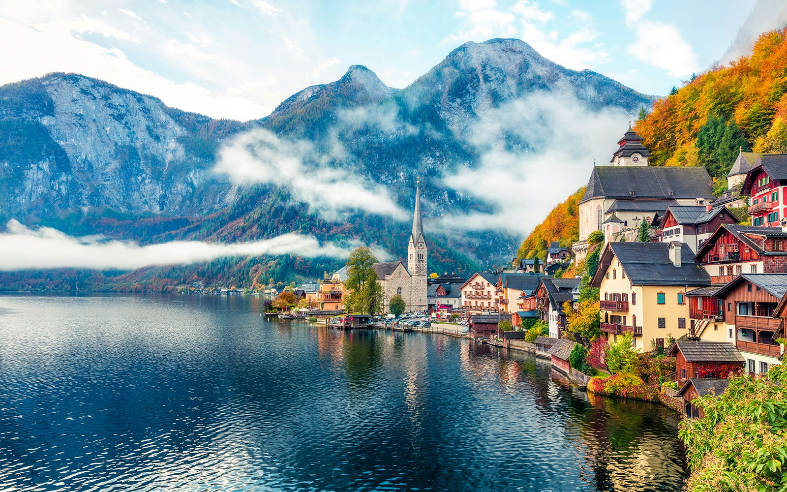 Hallstatt village by the lake with mountains in Austria.