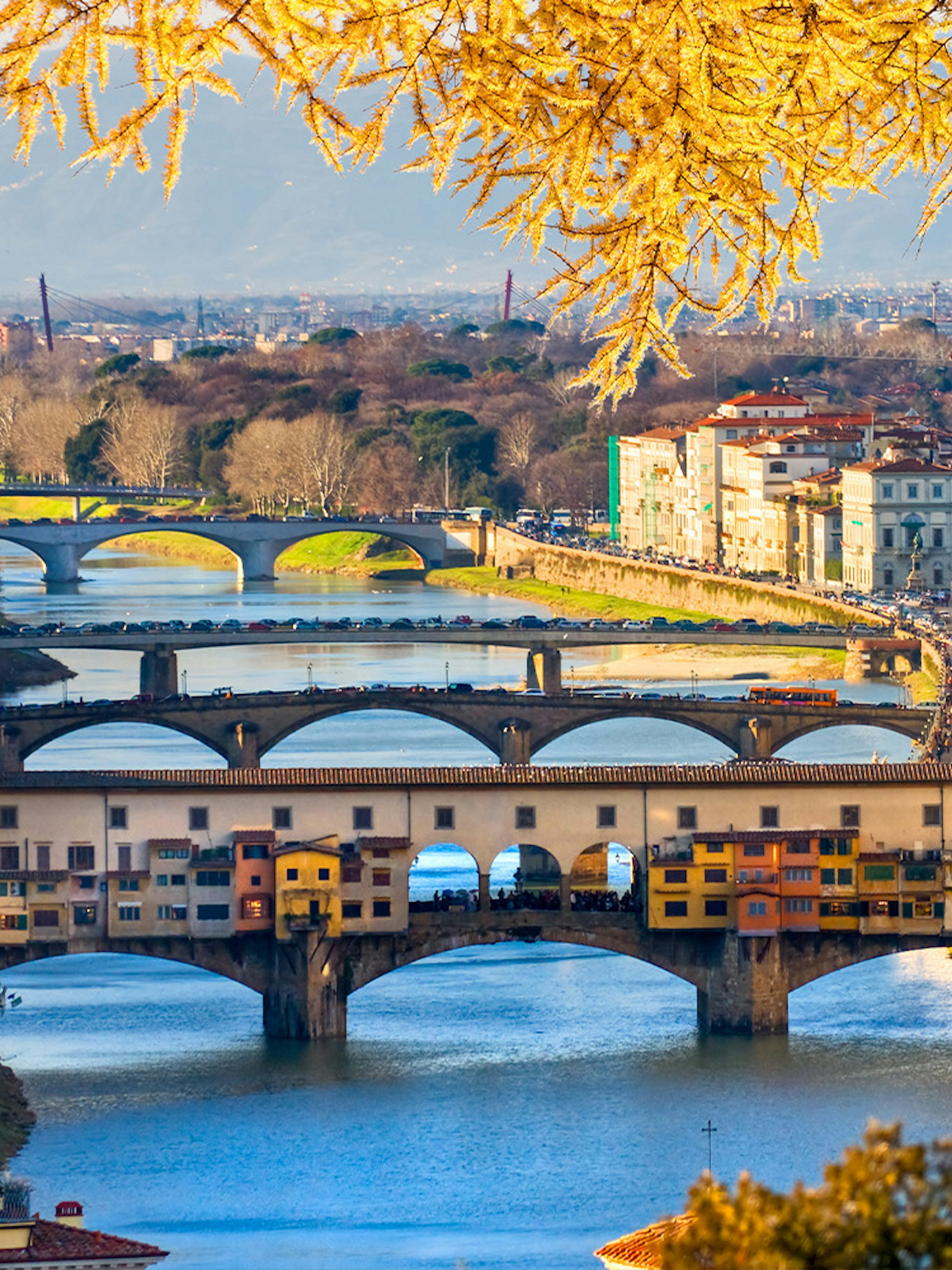 Ponte Vecchio over Arno River in Florence during New Year celebrations.