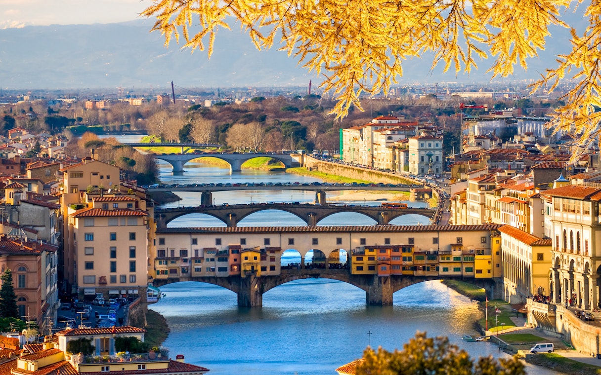 Ponte Vecchio over Arno River in Florence during New Year celebrations.