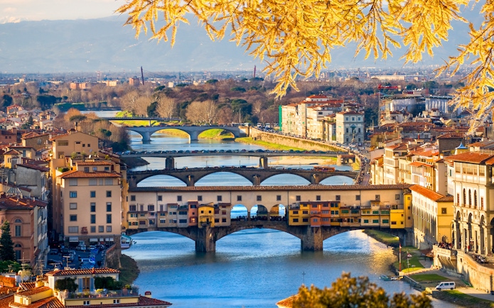 Ponte Vecchio over Arno River in Florence during New Year celebrations.