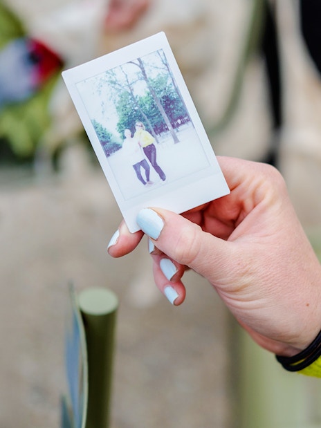 Person holding a polaroid during Emily in Paris Food Tour.