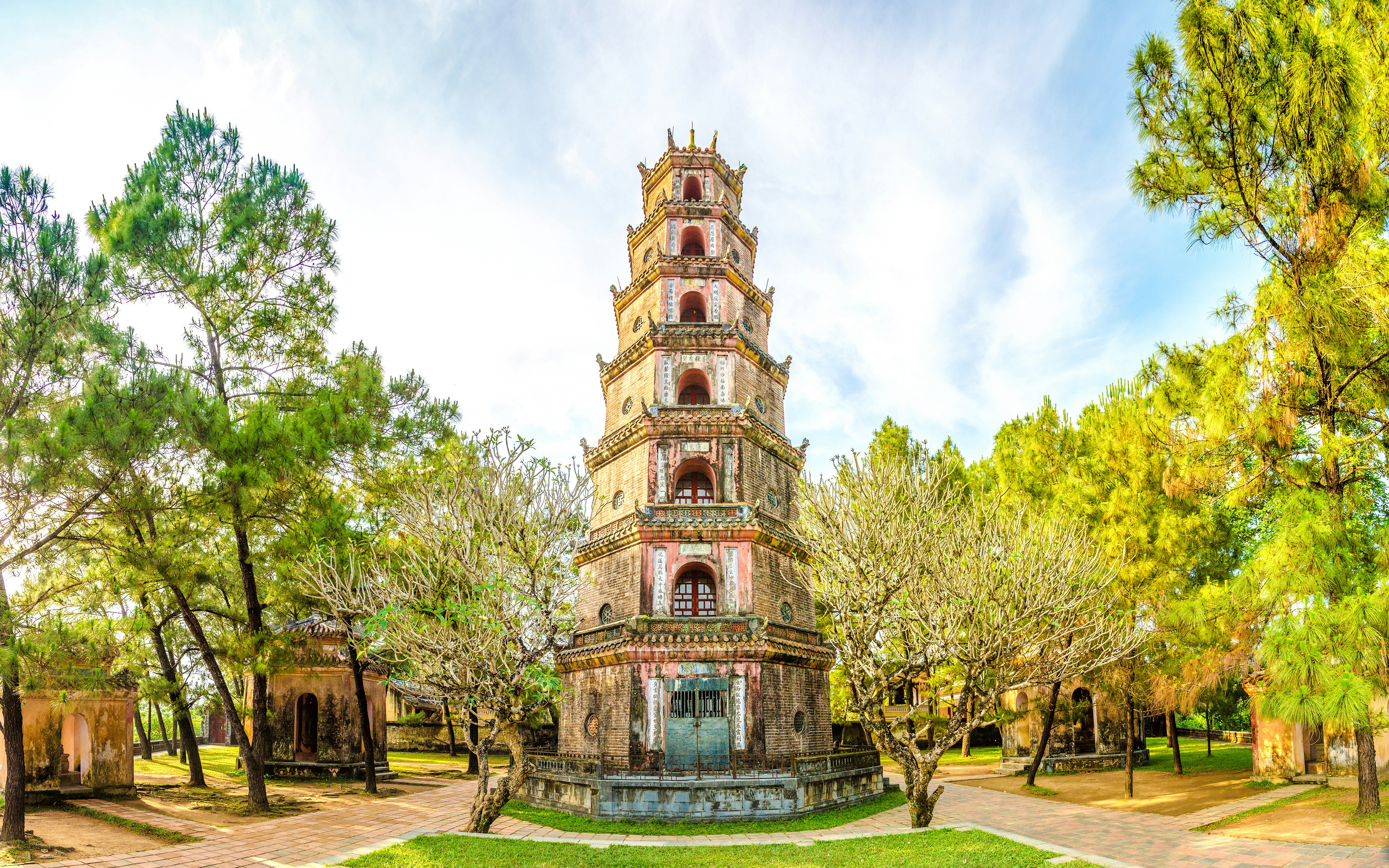 Thien Mu Pagoda surrounded by trees in Hue, Vietnam.