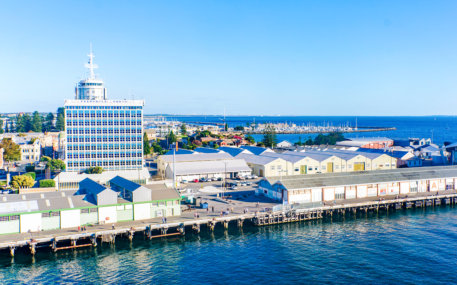 Fremantle Harbour with waterfront buildings and docked boats in Western Australia.