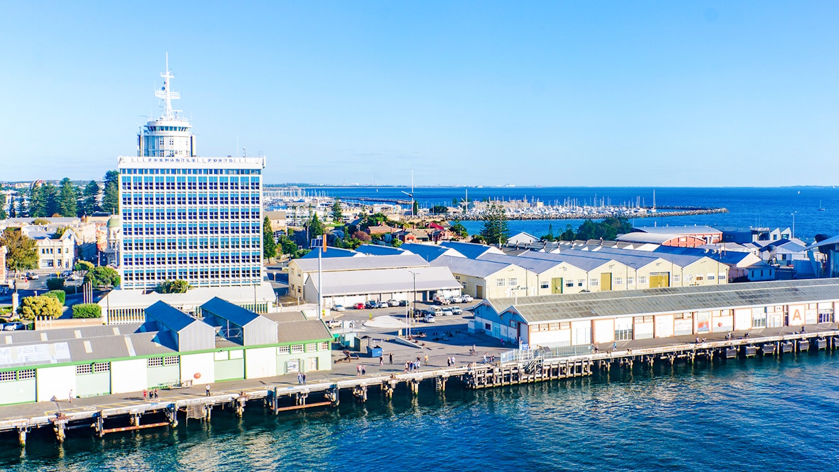Fremantle Harbour with docked boats and historic buildings in Western Australia.