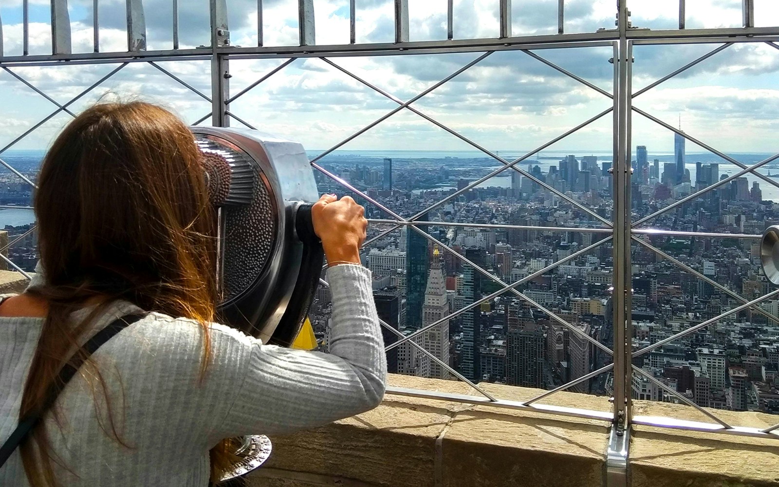 tourist enjoying Views from the 86th floor observation deck