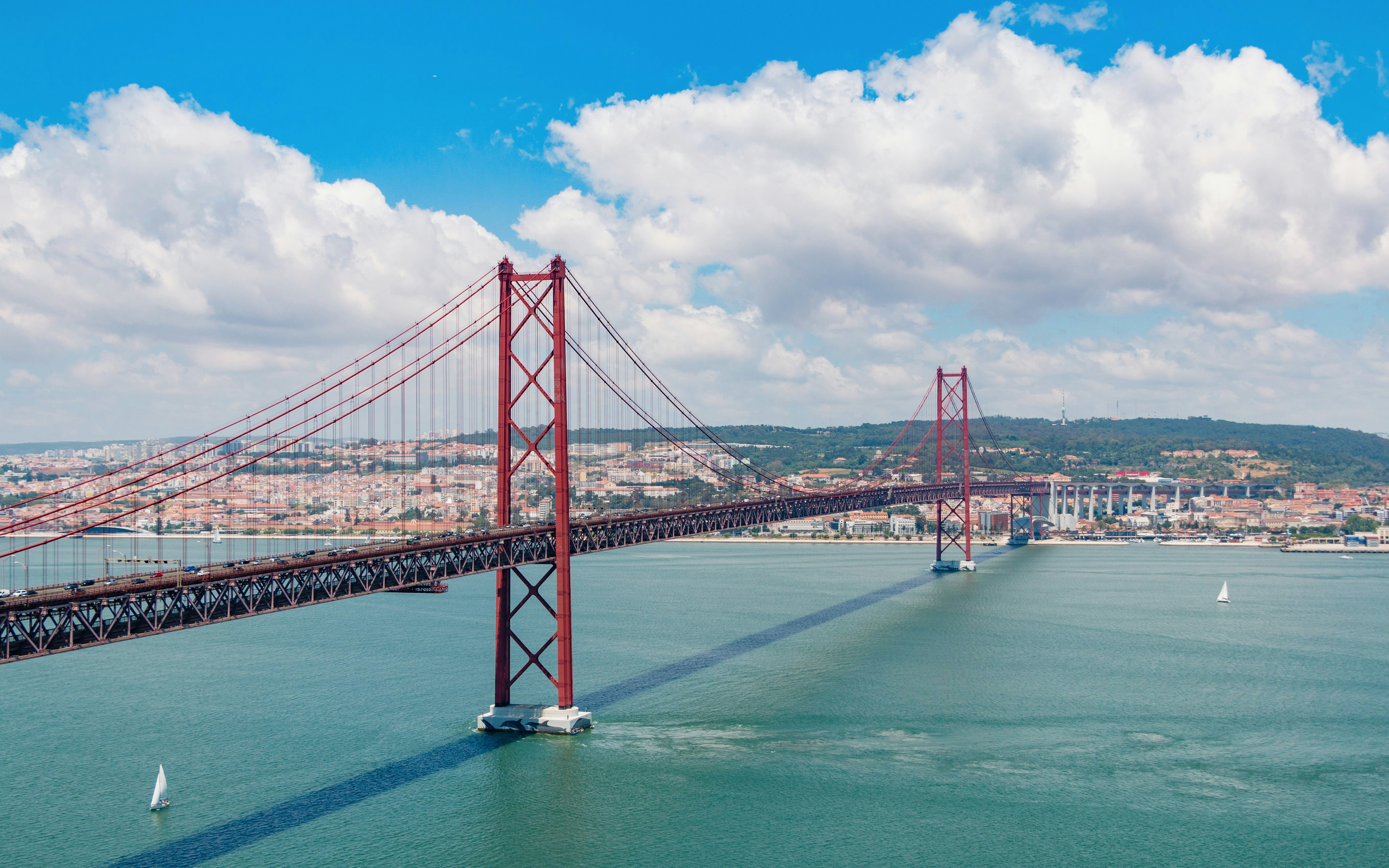 25 de Abril Bridge spanning the Tagus River in Lisbon, Portugal.