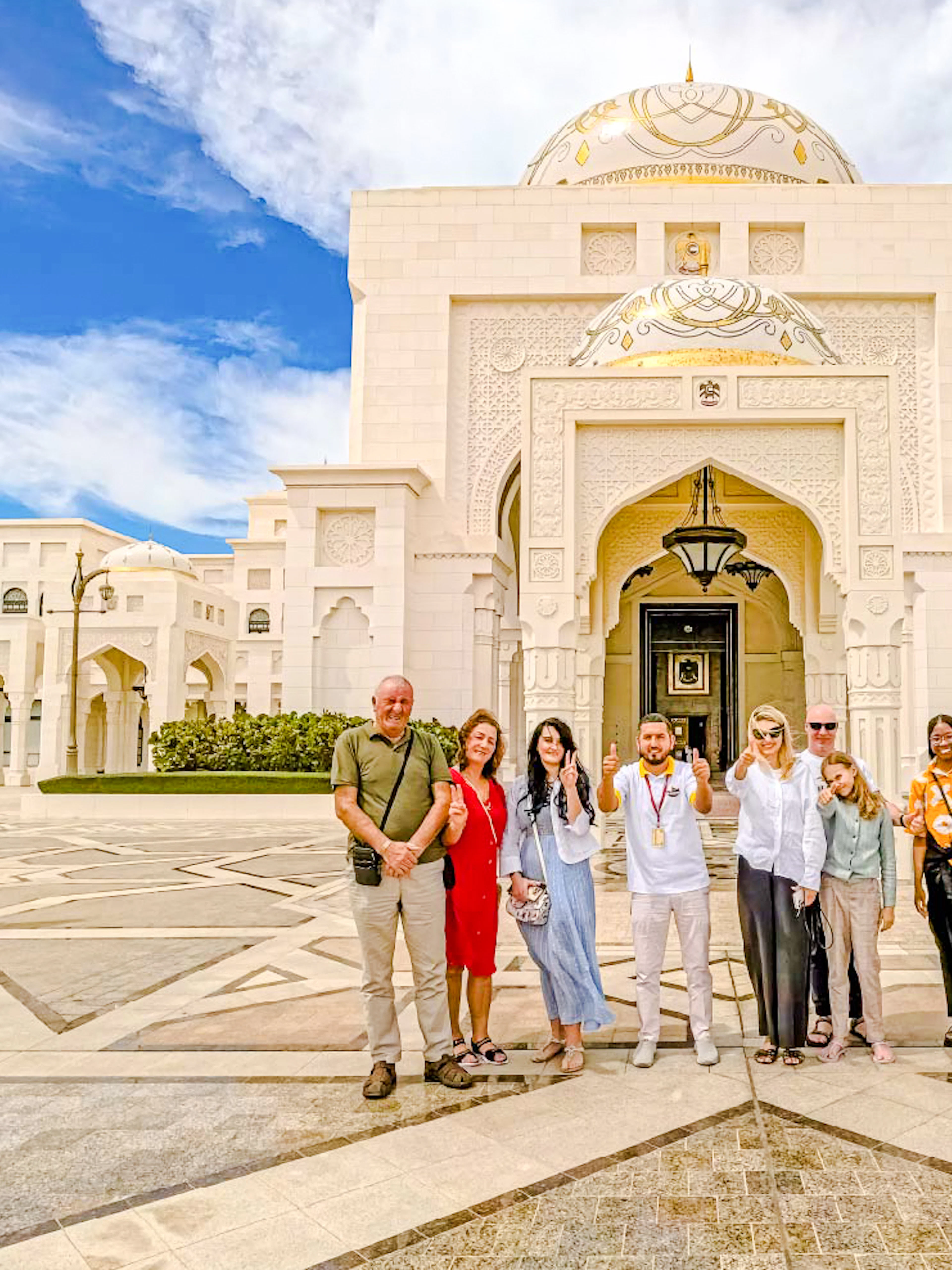Tour group with guide at Qasr Al Watan entrance, Abu Dhabi.