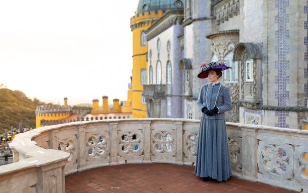 Visitor in period costume at the Palace of Pena, Sintra, Portugal.
