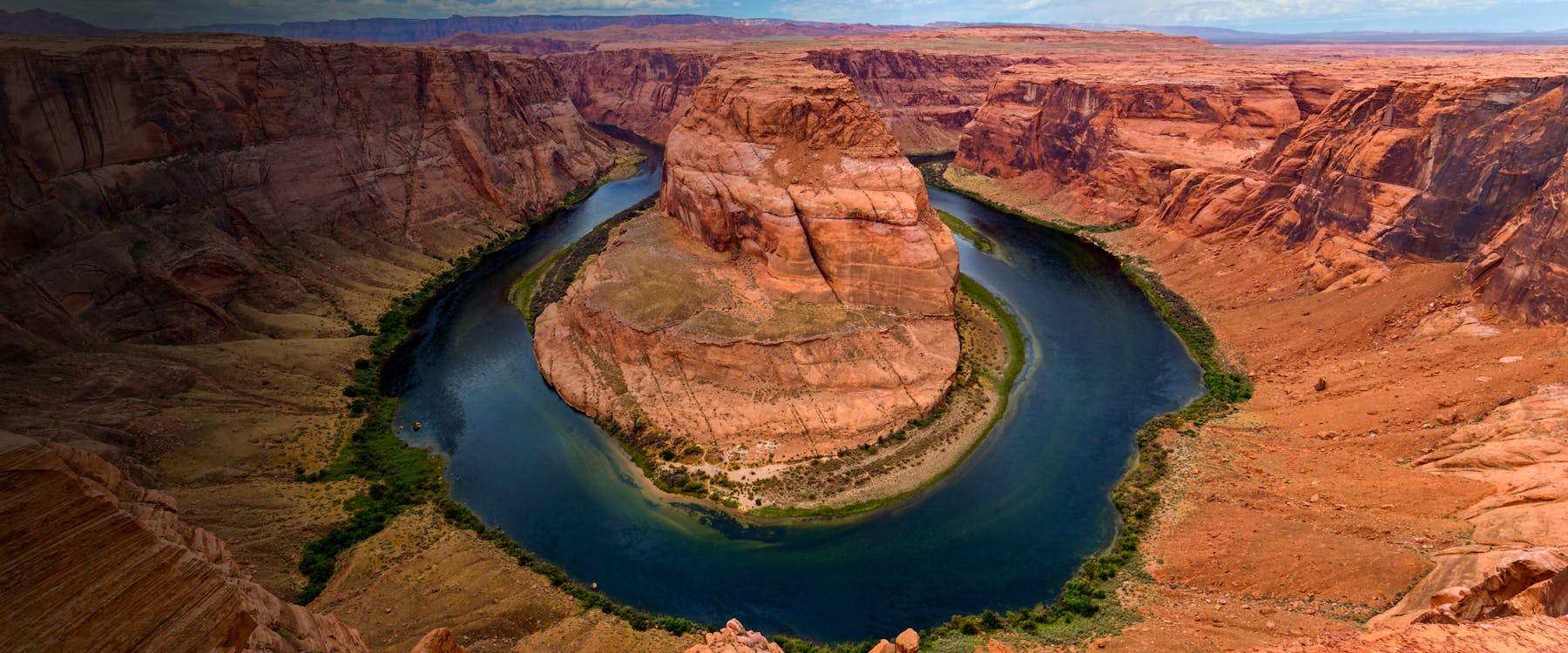 Horseshoe Bend in Page, Arizona, with the Colorado River curving around a sandstone formation.