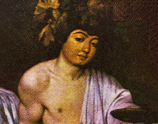 Close-up of a Caravaggio painting, showcasing dramatic use of light and shadow, at Uffizi Gallery