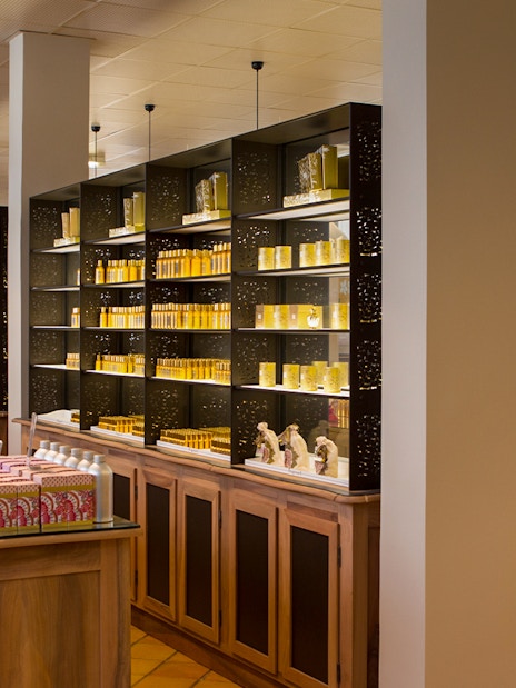 Perfume workshop interior with shelves of fragrance bottles in Eze-Village near Nice and Monaco.