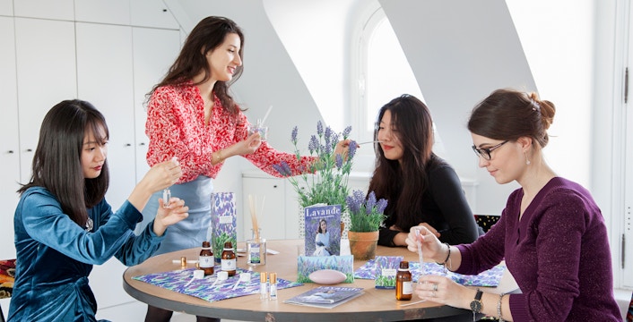 Female participants making perfume during Mini Perfume Workshop in Grasse