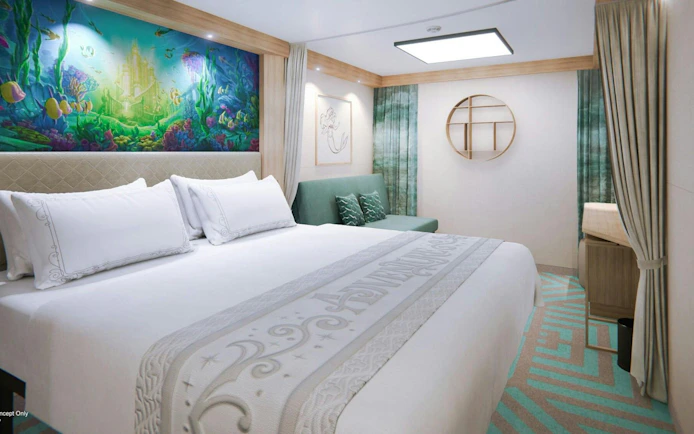 Deluxe cruise cabin with ocean-themed decor and comfortable bedding.