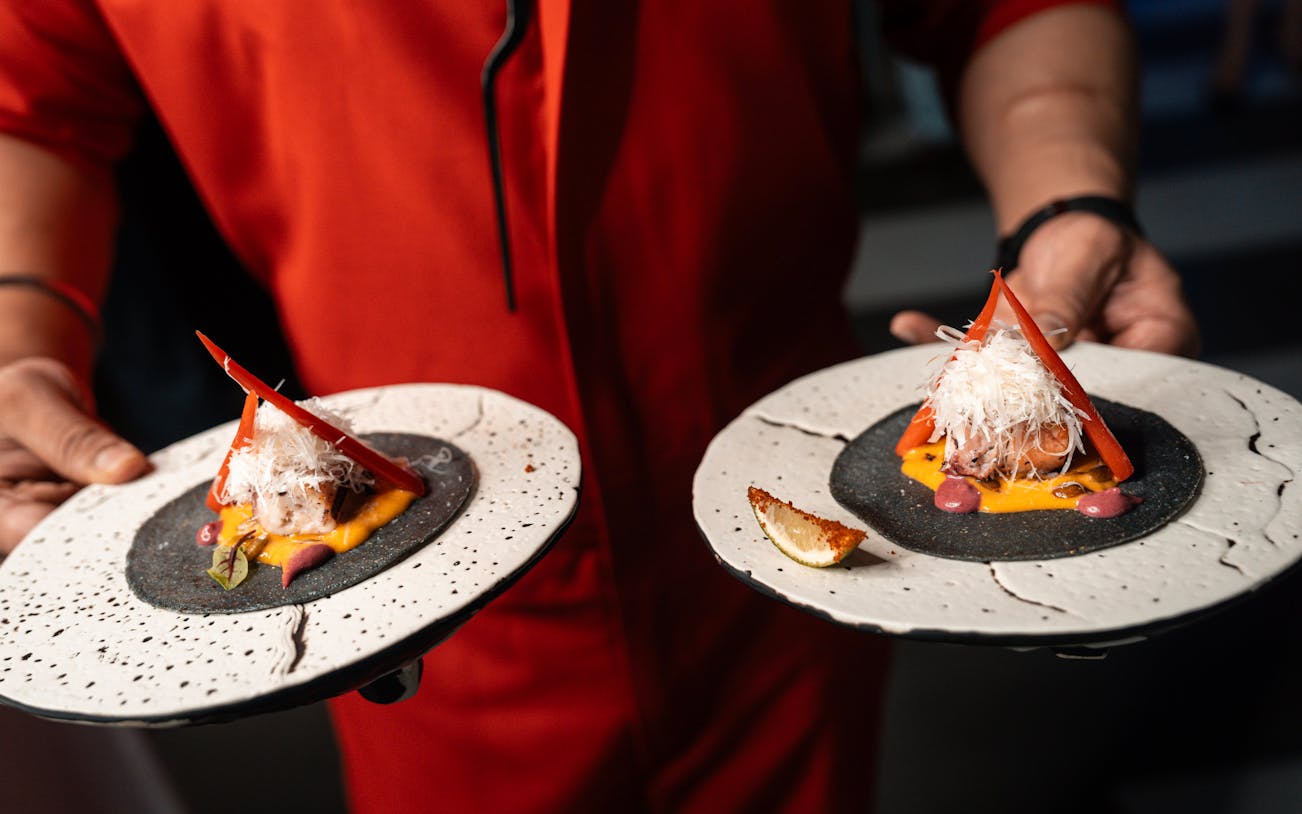 Plates of gourmet food served at STREETXOLAND Saturday Brunch, Dubai.