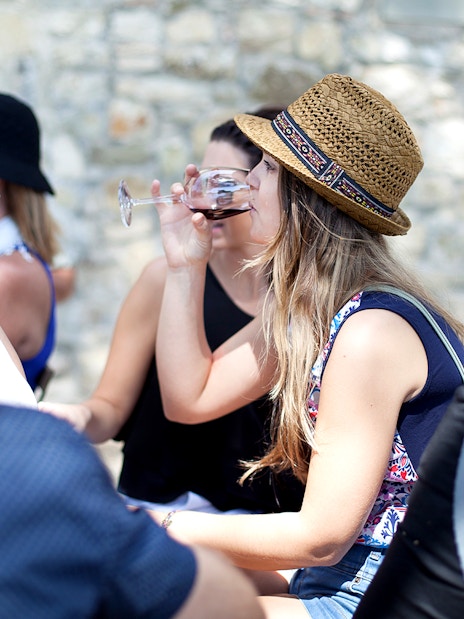 Group enjoying wine tasting during Chianti tour.