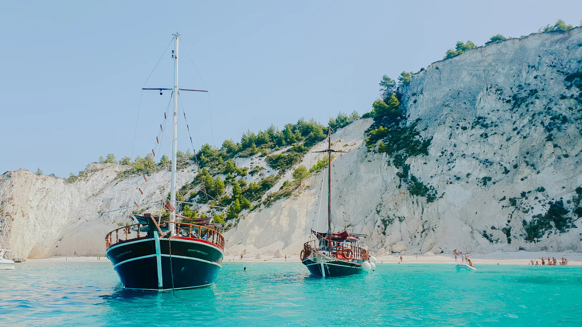 Kefalonia Wooden Boat Cruise to White Rocks Beach & Vardiani Islands with Greek Lunch and Snorkeling