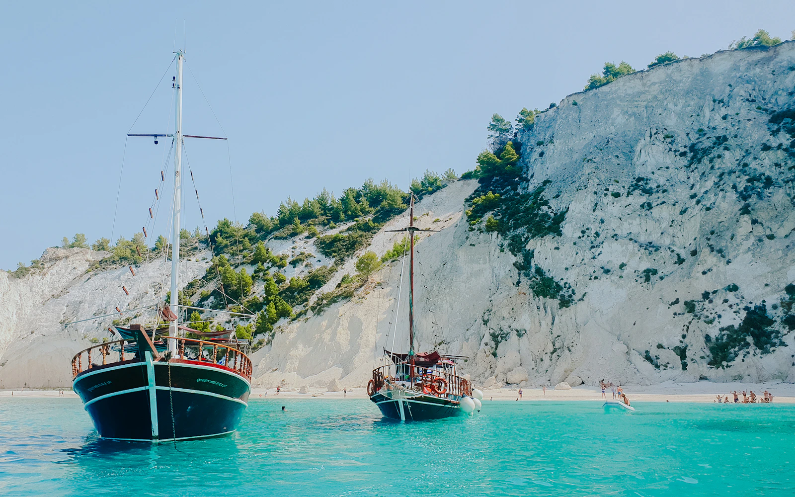 Kefalonia Wooden Boat Cruise to White Rocks Beach & Vardiani Islands with Greek Lunch and Snorkeling