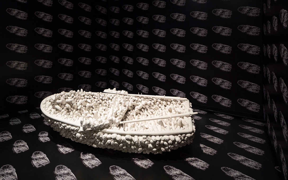 Boat sculpture with textured surface in Stedelijk Museum's Everyday, Someday and Other Stories exhibit.