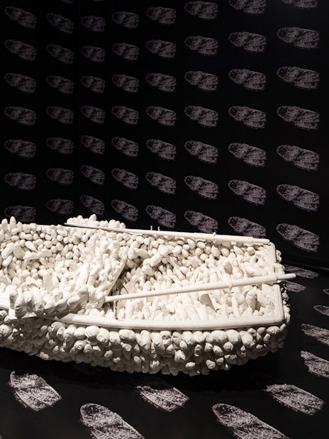 Boat sculpture with textured surface in Stedelijk Museum's Everyday, Someday and Other Stories exhibit.