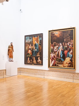 Paintings and statue in the National Museum of Ancient Art, Lisbon.