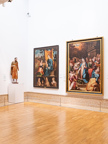 Paintings and statue in the National Museum of Ancient Art, Lisbon.