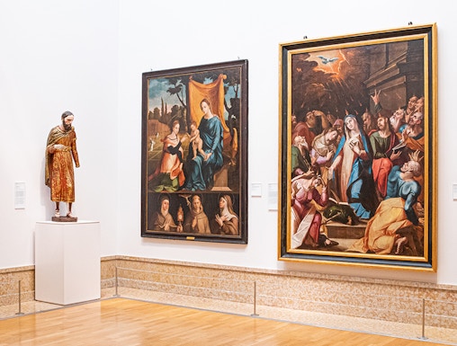 Paintings and statue in the National Museum of Ancient Art, Lisbon.