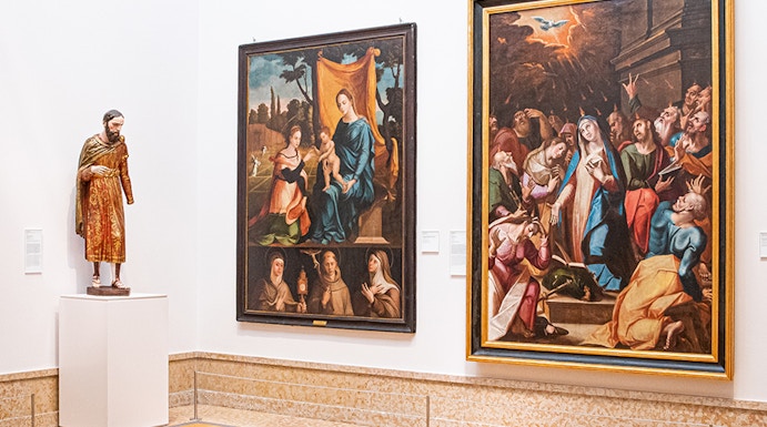 Paintings and statue in the National Museum of Ancient Art, Lisbon.