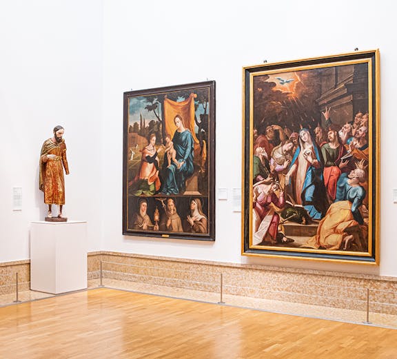Paintings and statue in the National Museum of Ancient Art, Lisbon.