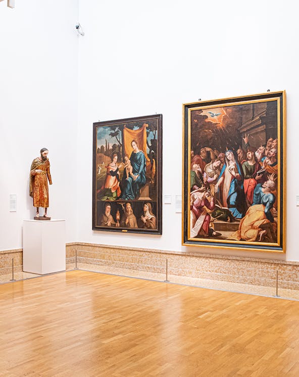 Paintings and statue in the National Museum of Ancient Art, Lisbon.