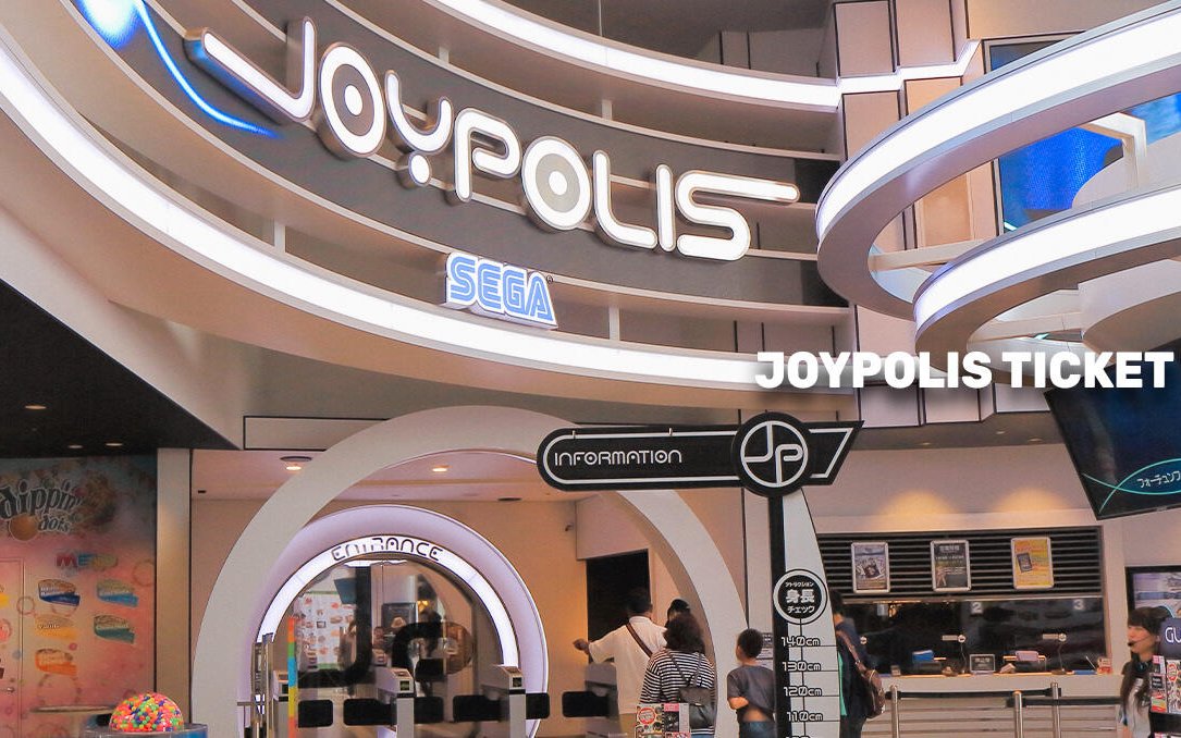 Joypolis entrance in Tokyo with visitors at ticket counter.