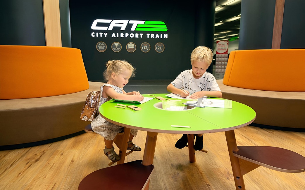Children drawing at Vienna City Airport Train lounge, Wien Mitte Station.