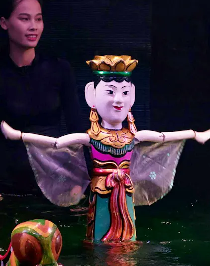 Performers with puppets at Thang Long Water Puppet Show in Hanoi, Vietnam.